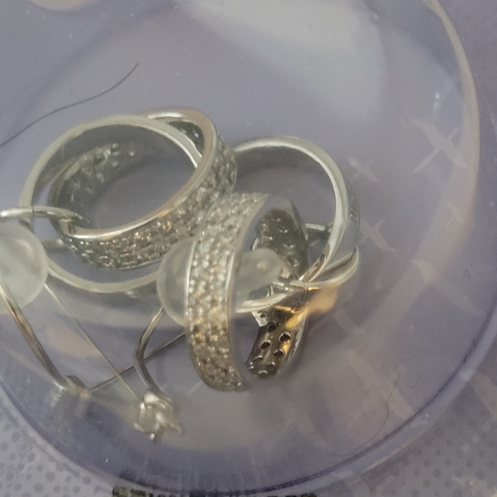 Pair of New Huggie silver earrings